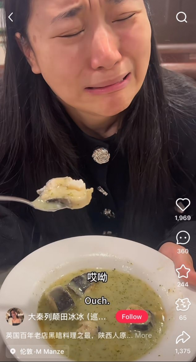 Making her eel: Tian Bi Bi can't hold back her emotions as she tucks into traditional eel soup