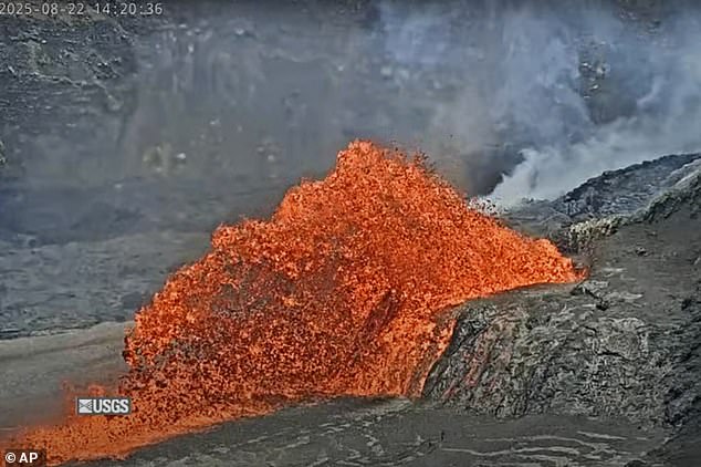 A screenshot from the US Geological Survey's video shows the Kilauea volcano spewing lava yesterday