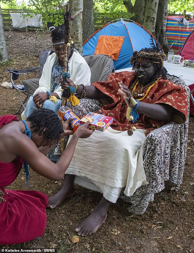 Offeh (right) claims to have taken both women as wives, and will only engage with outsiders once offered gifts
