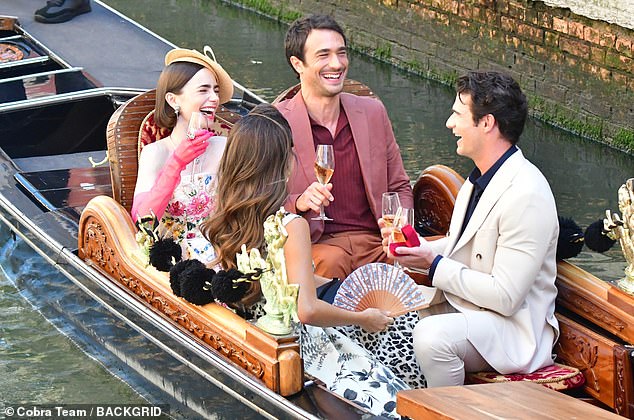 Lily Collins, Ashley Park (front left), Eugenio Franceschini, and Paul Forman (front right) were all seen shooting the scenes on Saturday