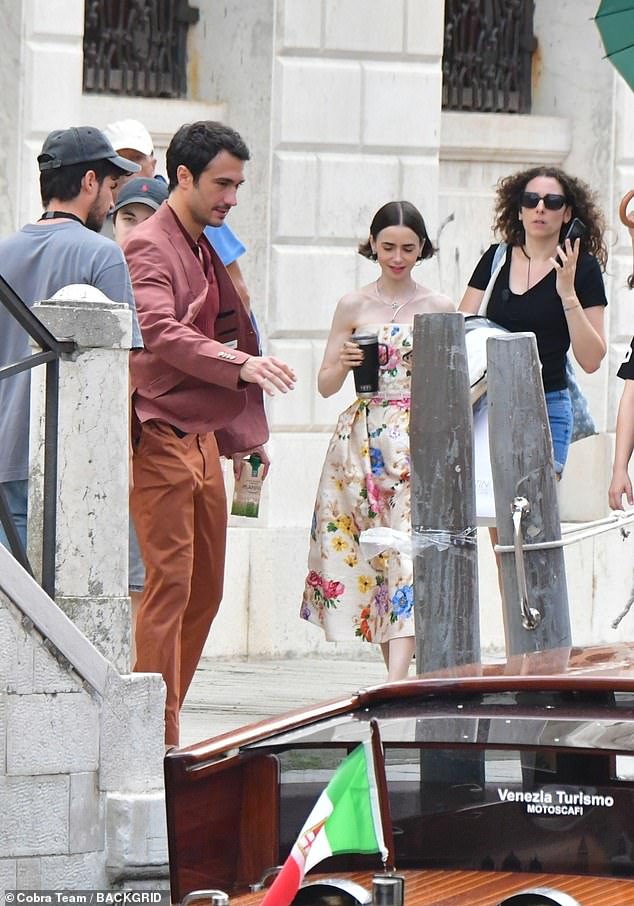 Franceschini looked about him as he strolled along the Venice waterfront dressed in orange trousers, a burgundy polo shirt and pinkish suit jacket
