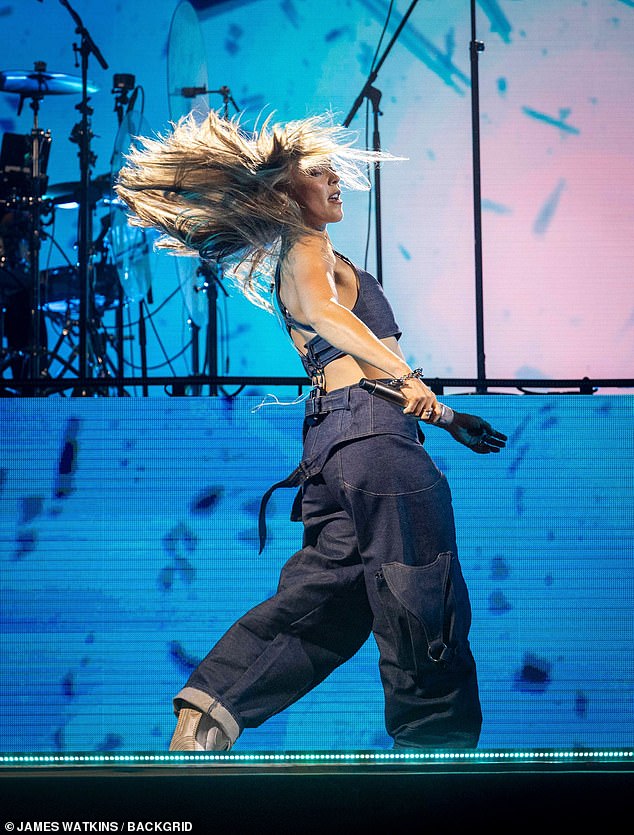 Like Sophie, Becky had a striking outfit and wore a pair of denim cargo pants and a matching denim crop top