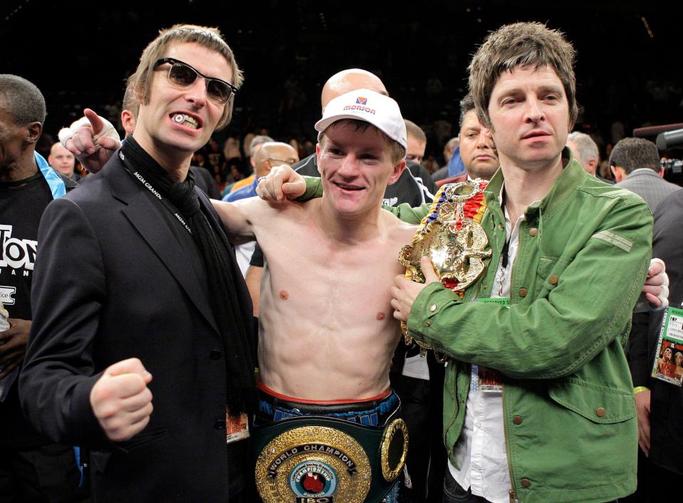 Ricky Hatton celebrates his boxing victory with Oasis members Noel and Liam Gallagher.