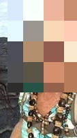 Woman with long dark hair smiling, next to a color palette.