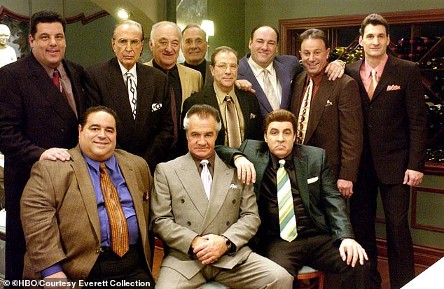 Adler made his series debut on the pilot and continued with The Sopranos into its final season in 2007. Gandolfini died at 51 in 2013 of a heart attack; pictured in 2004 on top (L–R): Sopranos stars Steve Schirripa, George Loros, Adler, Arthur J. Nascarella, Dan Grimaldi, Gandolfini, Tony Darrow and Robert Funaro. Bottom row: Joseph Gannascoli, Tony Sirico and Steven Van Zandt
