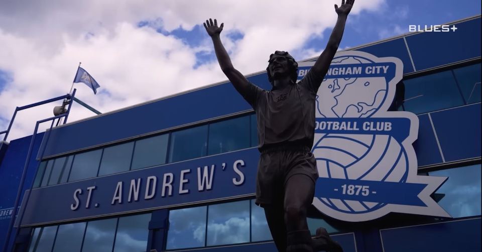 Statue of a Birmingham City footballer outside St. Andrew's stadium.
