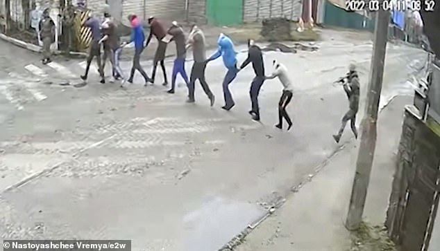 Bucha - a quiet commuter town just outside of Kyiv - became a byword for Russian barbarism in 2022, when retreating Kremlin troops left behind mass graves and streets littered with bodies. Pictured: The Russian massacre in Bucha, Ukraine in 2022