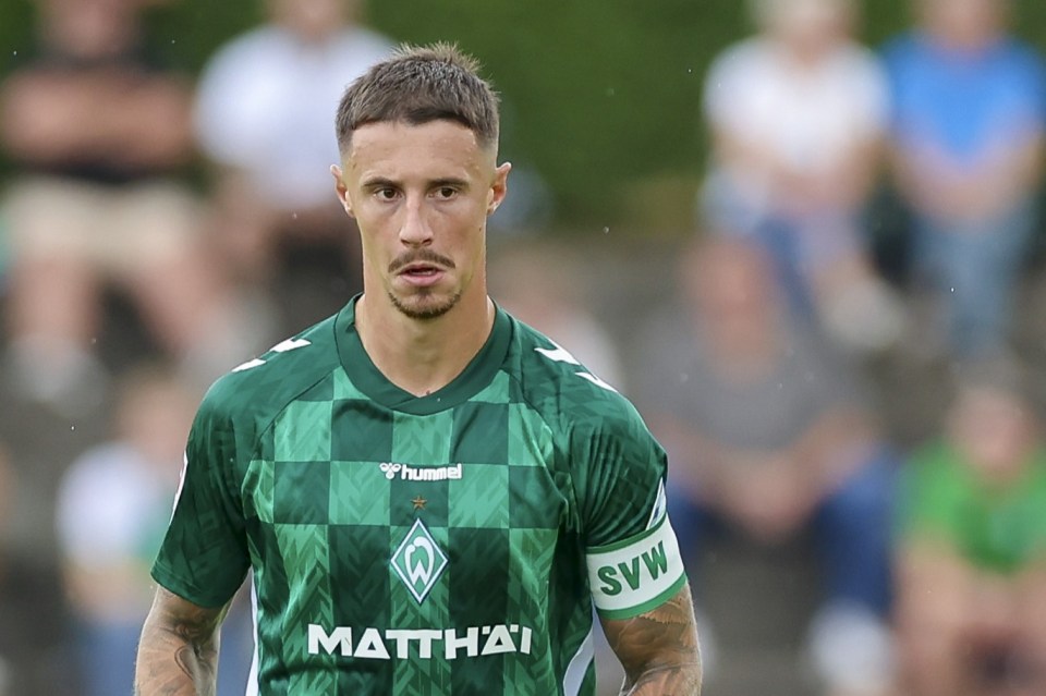 Marco Friedl of Werder Bremen controls the ball during a friendly match.