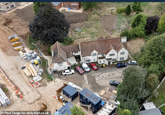The owner left the prestigious property, tucked away behind a row of tall trees, years ago after a spate of terrifying break ins