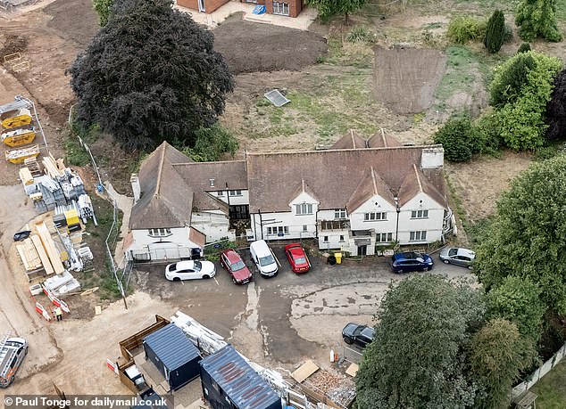 The home is much larger than any houses around it and sticks out due to its colossal size