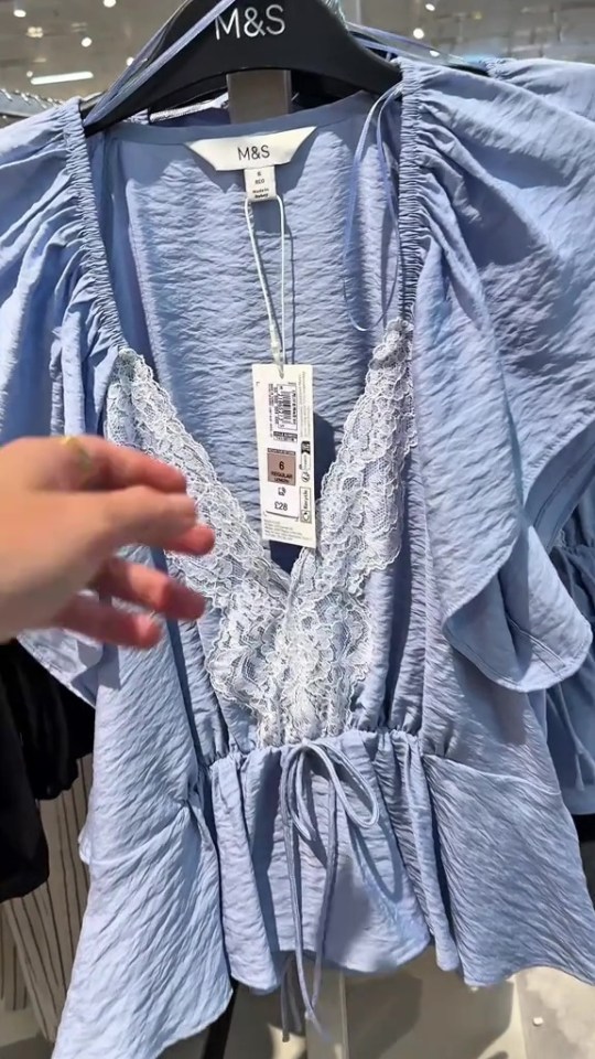 Light blue M&S blouse with white lace detail.