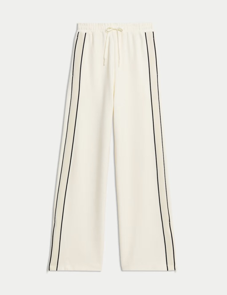 Wide-leg trousers with side stripes.