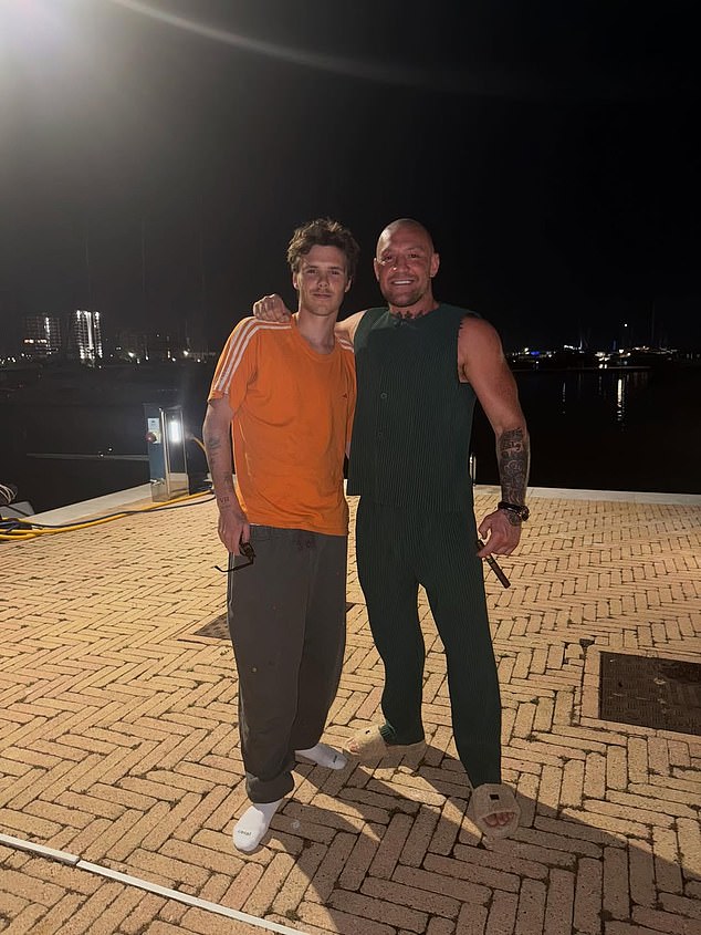 The former two-weight UFC champion could be seen clutching a cigar in the photos