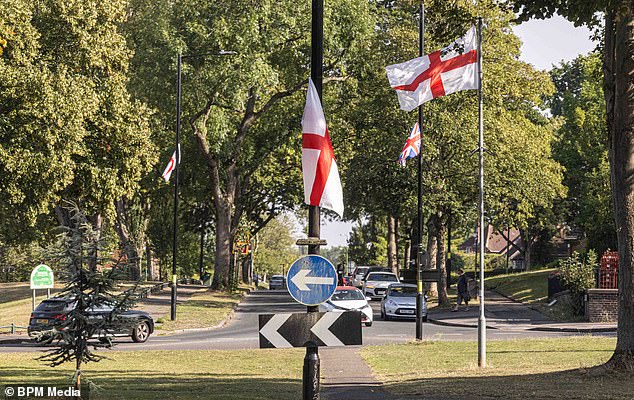 The furore began when Birmingham City Council announced it would take down hundreds of flags put up on lamp posts in recent weeks by a group who described themselves as 'proud English men', but who would not reveal their identities