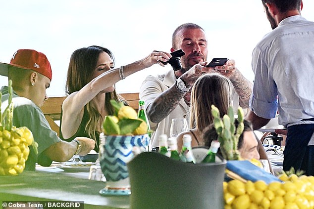 Victoria snapped pictures of their foot as it arrived while David took pictures on his phone