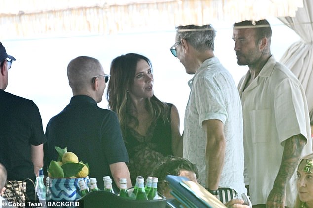 They were dining at the same restaurant as Richard E Grant, who was seen going over to the family to say hello after he previously worked with Posh Spice