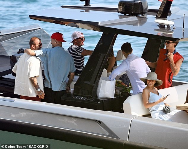 Romeo wrapped his arm around his father's shoulders