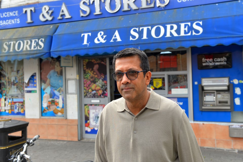 Shop owner Zahid Akbal outside his store.