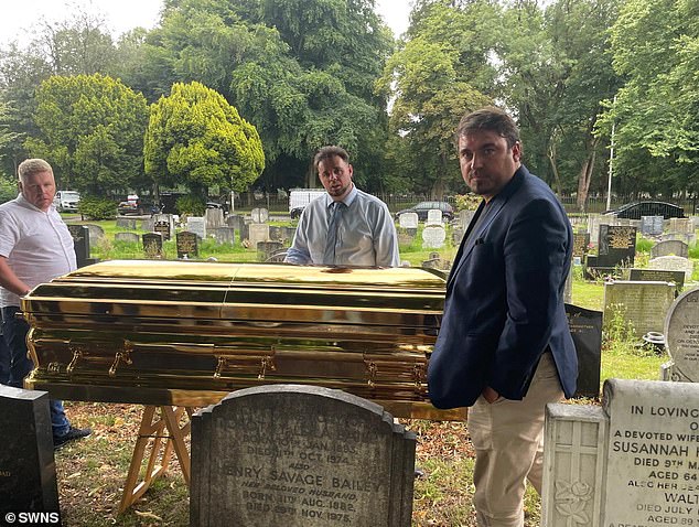 Family members with Thompson aka Tomney's 'six-figure' solid gold coffin before burial