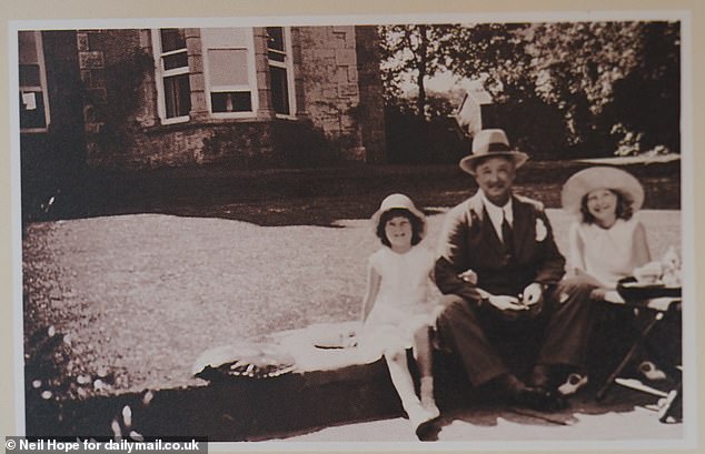 The childhood home of Pilcher (left) in Lelant, in 1928, with her father Charles Scott and sister Lalage