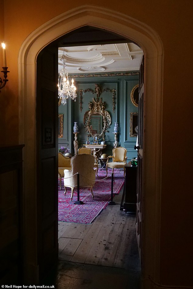 A grand panelled reception room, called the Grenville Room (pictured), often serves as a hotel bar or reception in the films and is sought out by tourists for a quick snap