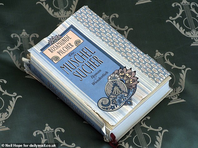 Pilcher was prolific in her writing until retiring in 2000 – she wrote 25 novels and eight short stories, novellas, collections and anthologies, all with the same Mills and Boon-esque plots. Pictured: A German-language version of The Shell Seekers