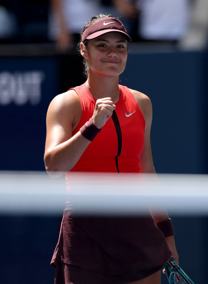 Emma Raducanu celebrating a match point.
