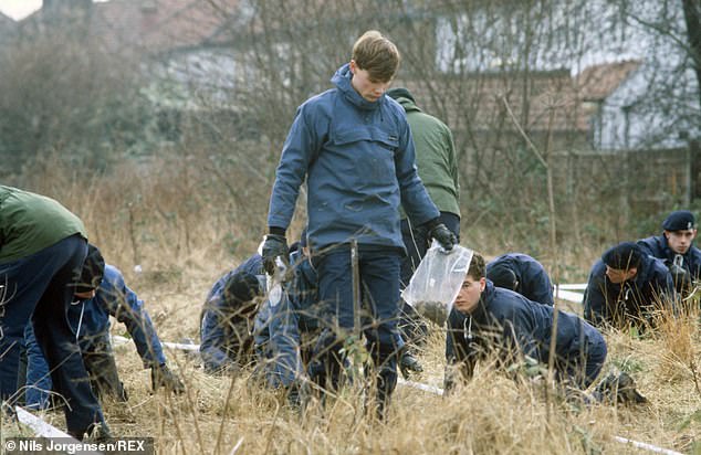 Officers searched in gardens behind the Cricklewood address after the serial killer was caught