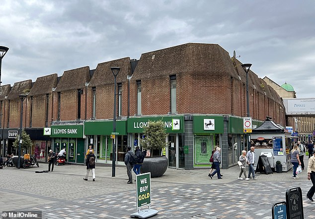 A businessman was murdered in the city's Lloyds Bank branch (pictured) in an incident which has shocked residents and left people too scared to visit the city centre