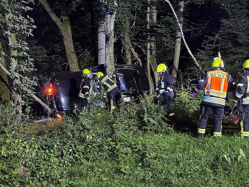 Emergency responders at a fatal car crash site.