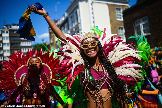 Notting Hill Carnival, the largest street party in Europe, officially begun on Sunday morning with dancers in bright costumes parading along the streets