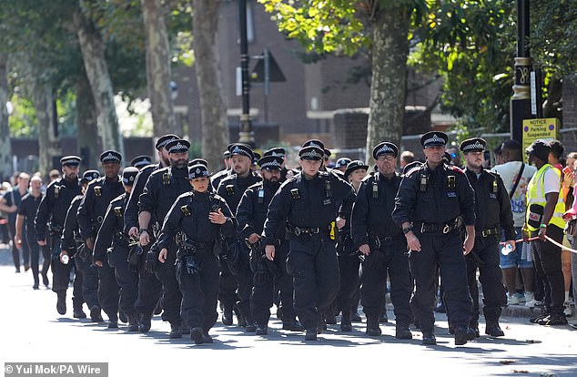 An army of police officers prepare for duty during the Children's Day Parade today