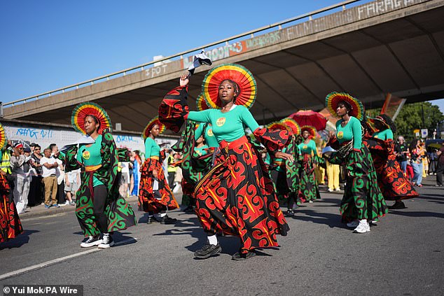 Dancers during the Children's Day Parade in Notting Hill on Sunday