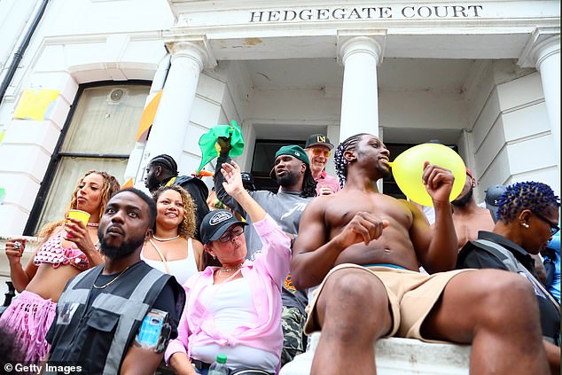 Revellers attend Notting Hill Carnival on August 24, 2025