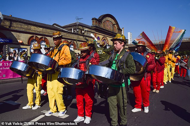 Steelpan musicians take part in the parade on the opening day of Notting Hill Carnival 2025