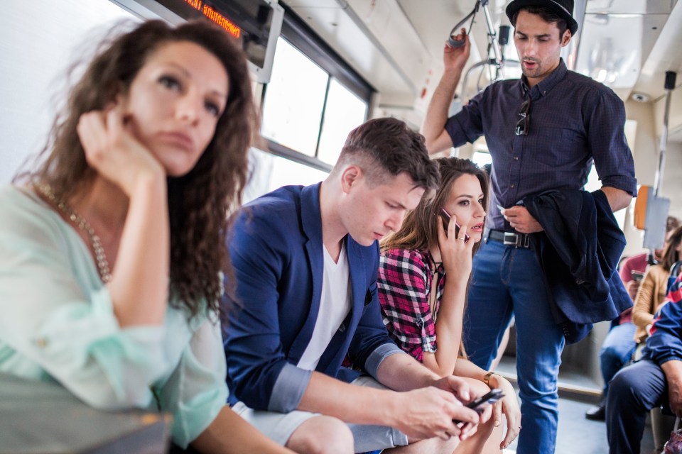 Young adults commuting on public transportation.