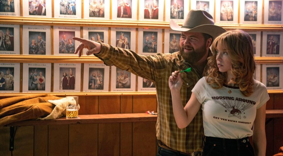 Paul Walter Hauser and Sydney Sweeney in a scene from 2RA37BF.