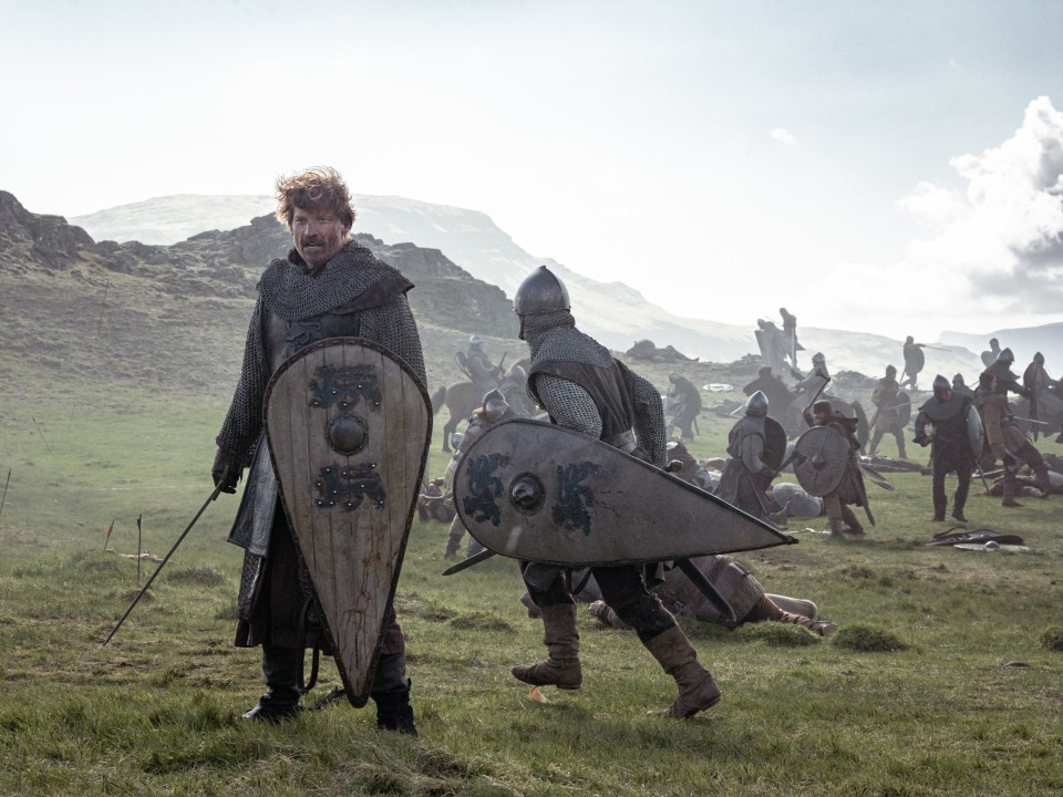 Medieval soldiers in battle.