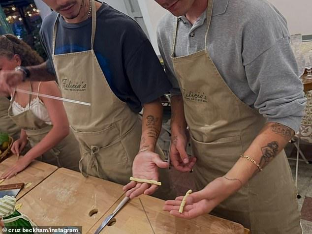 He was also also seen sporting an apron with his dad as the Beckhams enjoyed a pasta making class