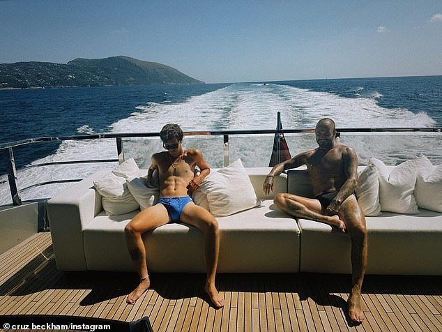 Taking to Instagram on Sunday, Cruz was the spitting image of his dad David as the father and son relaxed on a luxury yacht