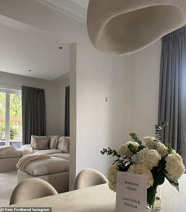 Kate shared a snap of their crisp cream living room filled with plush interiors