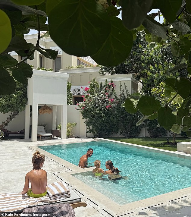 The couple were joined by their children as they enjoyed a pool day in their new home