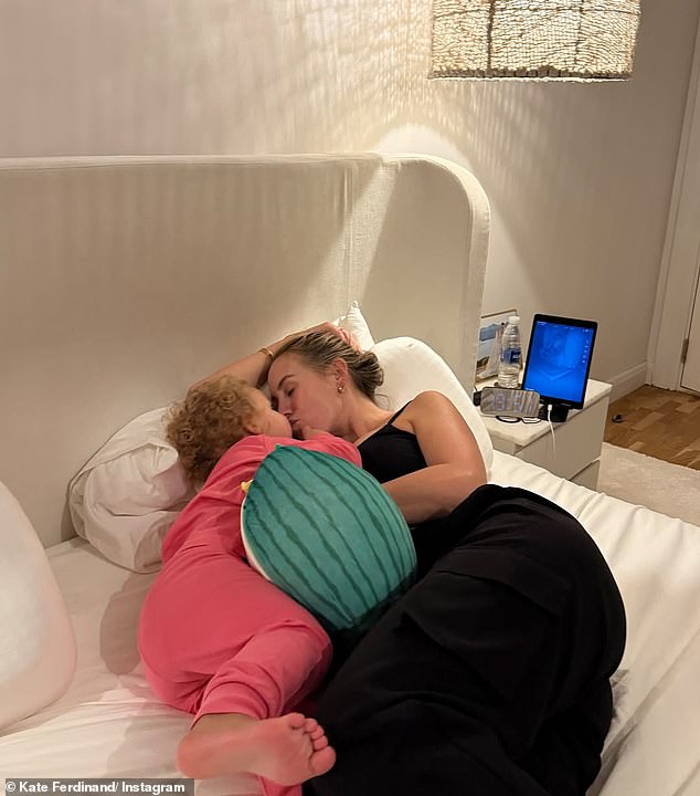 In another sweet snap, Kate relaxed on their new bed with son Cree after making the move