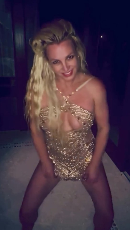 Britney Spear wardrobe malfunction as she falls out of dress covering her nipples with Emojis, https://www.instagram.com/reel/DNTq60zxi2b/?utm_source=ig_web_copy_link,