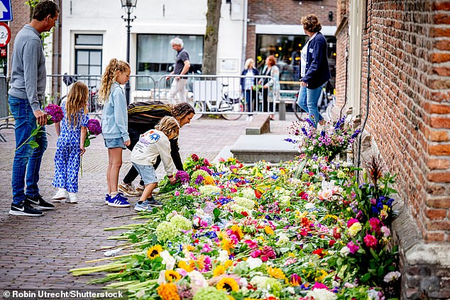 A sea of flowers at the village church in memory of Lisa, who was found dead along Holterbergweg in Duivendrecht