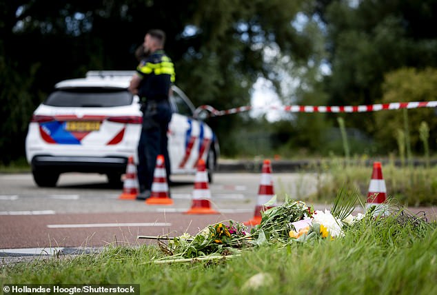 Flowers in memory of the 17-year-old girl who was found dead along a roadside in Duivendrecht