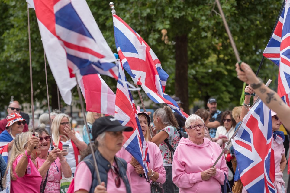 Anti-immigration protestors waving British flags.