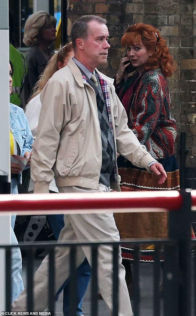 Katherine's character later appeared to be chatting on a 1980s mobile phone
