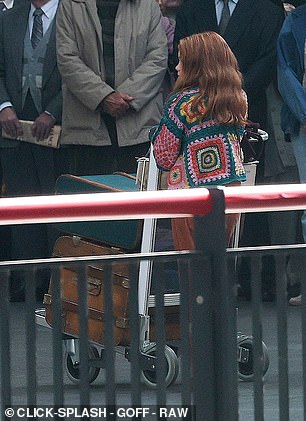 Actress Gracie was seen pushing a trolley with one of the young wizard's cases
