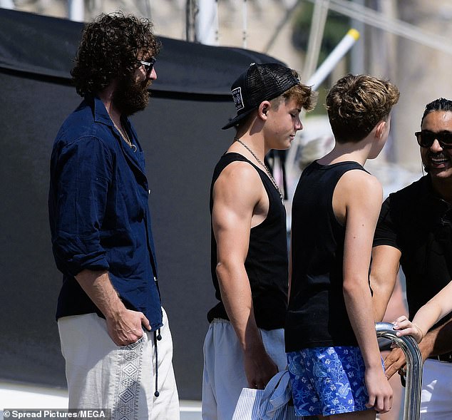 The couple were also accompanied by their sons Zachary, 14, and Elijah, 12, as they departed their swanky yacht